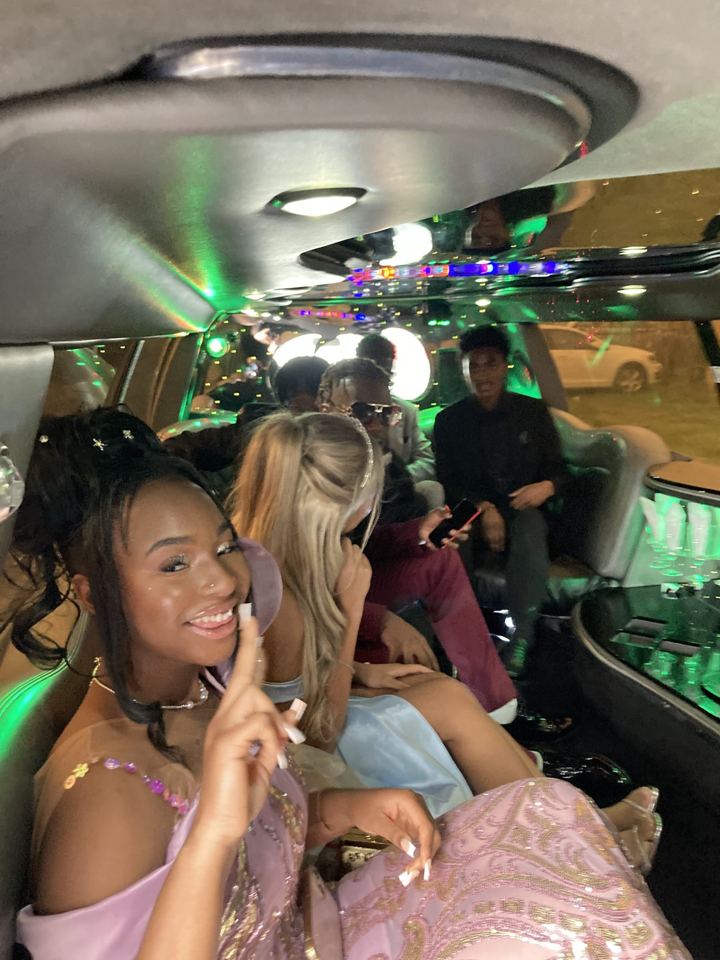 Prom group inside a limo with party lights, Nottingham