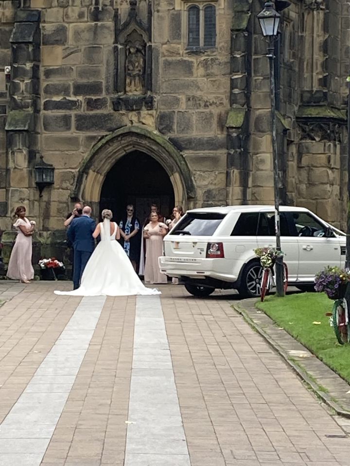 White Range Rover Sport wedding car at a church, Harrogate